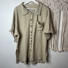 Brand: Free People Size: Small Condition: New Without Tags Description: Women’s Oversized Button Down Shirt. One Large Right Breast Pocket And Mid Length Sleeves. Ribbed Design With Side Slits. Shoulder To Hemline -31” Pit To Pit -25”. Oversized Beige Buttoned Top, Beige Relaxed Fit Top With Buttons, Everyday Beige Shirt With Buttons, Everyday Khaki Shirt With Buttons, Everyday Khaki Shirt, Beige Button-up Top With Button Cuffs, Oversized Neutral Tops With Pockets, Oversized Neutral Top With Pockets, Beige Tops With Buttoned Pockets For Everyday