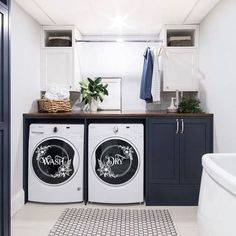 a washer and dryer in a small room