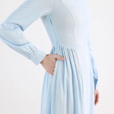 "This Vintage inspired Medieval dress Crafted with soft cotton linen in blue hues, featuring pleated detail on the waist, this Long sleeve maxi dress will give you a perfect silhouette. This is a sophisticated, simple, timeless but also somehow contemporary. Wear this blue dress for your leisurely life. DETAIL * Medium weight cotton linen blend fabric (50% Linen, 50% Cotton) * Two side seam pockets * Long Lantern sleeve * Right side zipper * Pleat detailed waist * Ankle length * Perfect for both Cotton Pleated Maxi Dress For Daywear, Blue Cotton A-line Maxi Dress, Blue A-line Cotton Maxi Dress, Fitted Modest Cotton Maxi Dress, Blue Linen Long Sleeve Maxi Dress, Blue Linen A-line Maxi Dress, Fitted Blue Linen Dress For Daywear, Elegant Light Blue Cotton Midi Dress, Modest Blue Maxi Dress For Daywear