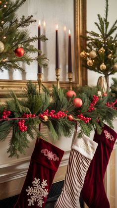 christmas stockings hanging from a mantel with candles in the background