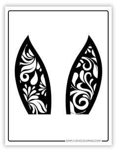 two black and white wings with floral designs on them