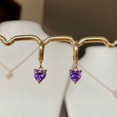 💜Gold plated Violet heart cubic huggie hoop earrings, birthstone, Amethyst, February, gift for her This earring features a lovely heart-cut Amethyst , which is the birthstone for February💜 * Hypoallergenic jewelry  * Hoop size: 12mm * Charm size: 7mmx7mm * Gold plated brass, Cubic zirconia  It comes with gift wrapped🎁 Free tracked shipping in the UK🚛 Shipped same or next business day🤍 Message me anytime for any questions💙   All earrings can also be made into necklaces.            Please me Small Hoop Huggie Earrings With Birthstone For Anniversary, Anniversary Small Hoop Huggie Earrings With Birthstone, Dainty Birthstone Huggie Earrings For Anniversary, Anniversary Birthstone Huggie Earrings In Small Hoop, Purple Small Hoop Jewelry For Gifts, Huggie Hypoallergenic Heart Earrings As Gift, Heart Cut Single Earring Jewelry As A Gift, Hypoallergenic Huggie Earrings For Valentine's Day Gift, Hypoallergenic Huggie Heart Earrings For Gifts