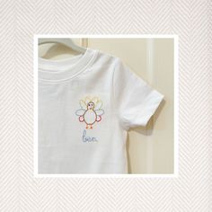 Make your children the talk of the town with this Hand Embroidered t-shirt! Perfect for Fall days, Thanksgiving parties, Fall parties, school, play or out and about! We love these paired with a pair of green gingham bloomers or shorts! For local Columbus, Georgia pickup use code LOCALPICKUP to wave shipping fees. You must be able to do porch pickup once item is completed. These shirts are 100% cotton and run true to size, but I normally size up for longer wear! Thanksgiving Hand Embroidery, Hand Embroidered Onesie, Gingham Bloomers, Hand Stitch Embroidery, Embroidered Onesie, Toddler Halloween Shirts, Fall Parties, Columbus Georgia, Turkey Shirts