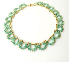 Turquoise & Gold  Necklace Netting Necklace by liorajewelry, $55.00 Turquoise Spacer Beads Jewelry For Party, Elegant Turquoise Beaded Necklaces With Gold Beads, Turquoise Bib Necklace With Round Beads For Gifts, Elegant Turquoise Beaded Necklace With Gold Beads, Elegant Gold Turquoise Necklace With Colorful Beads, Elegant Turquoise Beaded Necklaces With Spacer Beads, Elegant Turquoise Beaded Necklace With Spacer Beads, Turquoise Beaded Necklace, Turquoise Statement Necklace