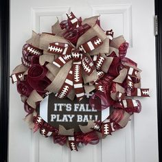 a football wreath that says it's fall play ball