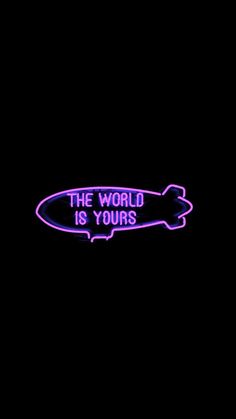 a neon sign that says the world is yours