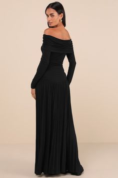 You'll exude effortless elegance no matter the occasion in the Lioness Field of Dreams Black Pleated Off-the-Shoulder Maxi Dress! Lightly textured, stretchy jersey knit shapes this iconic dress with an off-the-shoulder neckline and a fold-over detail that boasts ruching at the shoulders, framed by long sleeves. The figure-skimming silhouette features more ruching at the sides before falling to a pleated maxi skirt with a drop waist design. Fit: This garment fits true to size. Length: Floor lengt Off-shoulder Ruched Maxi Dress For Date Night, Stretch Boat Neck Evening Dress, Black Pleated Evening Dress, Pleated Maxi Skirt, Iconic Dresses, Drop Waist, Trending Dresses, Pleated Dress, Floor Length