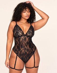 The Clarisse lace bodysuit is beautiful, bold, and unapologetically sexy. With all-lace paneling, unlined triangle cups, and a dramatic elastic lace-up back feature, this bodysuit is perfect for a special night in. (Available in plus-sizes XL-4X.) Stretch Lace Backless Bodysuit, Backless Lace Trim Bodysuit For Night Out, Fitted Bodysuit With Lace Closure For Night Out, Lace Bodysuit With Lined Body For Night Out, Fitted Lace Backless Bodysuit, Black Underwire Bodysuit With Lace Closure, Stretch Lace Underwire Bodysuit, Lace Stretch Bodysuit With Underwire, Stretch Lace Bodysuit With Underwire