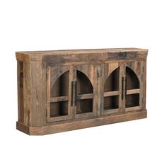 an old wooden cabinet with four doors