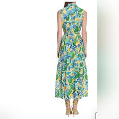 Donna Morgan For Maggy Floral Sleeveless Shirtdress Show Up In Style Wearing This Vibrant Floral Shirtdress Crafted In Stretch Cotton Poplin With A Flattering Waist Tie And Flounced Hem. 51 1/2" Length Point Collar Sleeveless 98% Cotton, 2% Spandex Machine Wash, Dry Flat Imported Approx Measurements Pit To Pit 20" Length 50" Yellow Floral Print Sleeveless Dress For Vacation, Yellow Sleeveless Midi Dress For Vacation, Yellow Midi Sleeveless Dress For Vacation, Sleeveless Lemon Print Dress For Spring, Yellow Cotton Sleeveless Vacation Dress, Sleeveless Green Dress With Vibrant Print, Yellow Sleeveless Maxi Dress With Floral Print, Yellow Sleeveless Floral Print Maxi Dress, Casual Multicolor Button-up Dress