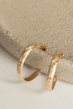 Flora Hoop earrings They give instant heirloom vibes, which we are here for! Made in 14k gold fill, meaning they are tarnish resistant and won't have to worry about discoloring on the skin. Plus, 14k gold fill is a metal that is hypoallergenic making perfect for those with sensitive ears. Measure approx 1 inch in diameter 14k Gold Hoop Earrings Stamped 14k, Stamped 14k Gold Small Hoop Jewelry, 14k Gold Small Hoop Jewelry Stamped 14k, Dainty Brass Hoop Earrings Tarnish Resistant, Gold Plated Hoop Jewelry Stamped 14k, Gold Small Hoop Huggie Earrings Stamped 14k, Gold 14k Stamped Small Hoop Huggie Earrings, Nickel-free 14k Yellow Gold Filled Huggie Earrings, Small Hoop Earrings In Stamped 14k Gold