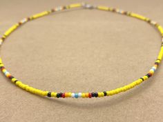 Czech Seed Bead Necklace, bead size 2.1mm (11/0), 17.5 inches long (#SB0140).  You will receive the exact necklace in this photo. The cord of this necklace is tarnish resistant steel wire coated in nylon.  It is 17.5 inches long. Clasp is zinc alloy with silver tone that is both lead and nickel free. Made in a smoke free home. Shipping is free and done through USPS. We can not accept refunds on this item. Laura May, Necklace Bead, Leaf Crafts, Seed Bead Necklace, Star Necklace, Bead Necklace, Seed Bead, Chain Styles, Zinc Alloy