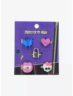 the monster high pin set is packaged in a purple package with pink and blue accessories