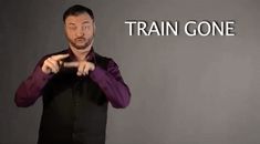 a man in a purple shirt is pointing at the words train gone on a gray background