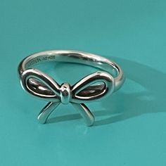 Silver Tiffany And Co Bow Right Size 5 Retired Jewelry Tiffany And Co, Jewelry Tiffany, Bow Ring, 5 Rings, Tiffany Co Jewelry, Tiffany And Co, Womens Jewelry Rings, Tiffany & Co., Ring Size