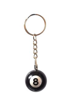 a keychain with a ball on it that has the number 8 in it