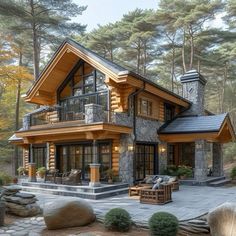 a large log home in the woods surrounded by rocks and trees, with stone steps leading up to it