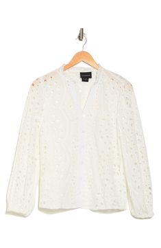 A button-up top crafted entirely from cotton is elevated by eyelet embroidery that offers sweeter styling. 27" length (size Medium) Split neck Long sleeves 100% cotton Hand wash, line dry Imported Casual Collared Blouse With Broderie Anglaise, Casual Collared Broderie Anglaise Blouse, Casual Broderie Anglaise Shirt For Spring, Spring Eyelet Blouse With Long Sleeves, Fall Cotton Blouse With Broderie Anglaise, Spring Collared Blouse With Broderie Anglaise, White Cotton Eyelet Blouse, Cotton Eyelet Top For Daywear, Elegant Cotton Eyelet Tops