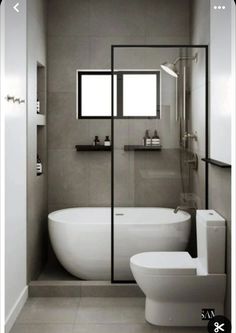 a bathroom with a toilet, sink and bathtub in black and white colors is shown