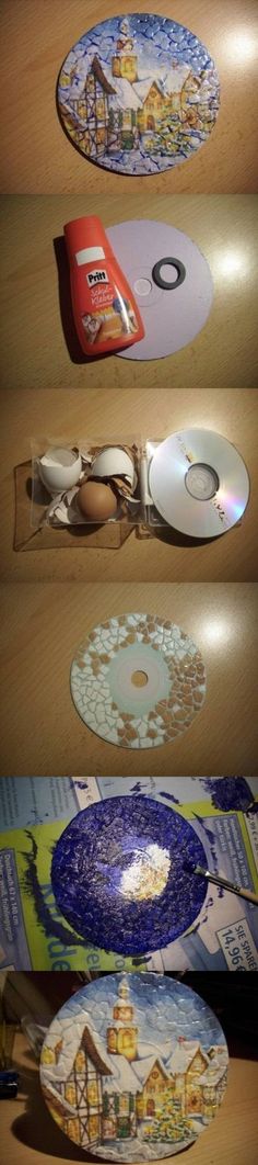 three plates with different designs on them sitting on a table next to an open dvd case