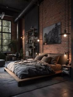 an industrial bedroom with brick walls and flooring is lit up by two lamps on either side of the bed