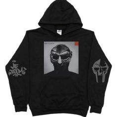 Mf Doom Madvillainy Pullover Hoodie Unisex S-4xl Mf Doom - R.I.P. - Hip Hop - Rap - Unisex - 2021 - New - Different Colors Vary Upon Request - Fast Shipping!!!! Mf Doom Clothes, Mf Doom Hoodie, Band Merch Hoodie For Halloween Streetwear, Halloween Band Merch Hoodie For Streetwear, Black Hip Hop Hoodie For Halloween, Black Halloween Hip Hop Hoodie, Halloween Techwear Hoodie With Graphic Print, Black Hoodie With Drawstring Hood For Fans, Black Hoodie With Graphic Print For Fans