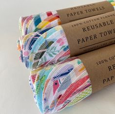 three rolls of reusable paper towels sitting next to each other