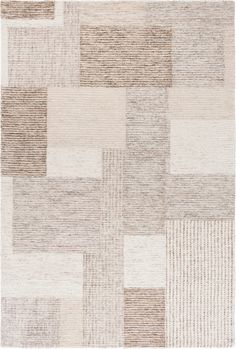 a beige and white rug with squares on it's sides, all in different colors