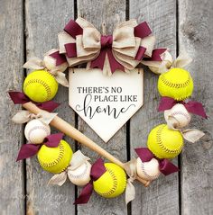 there's no place like home wreath with baseballs and bats