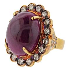 Impressive 18k yellow gold cocktail ring, set with an approx. 40cts ruby cabochon (measuring approx. 21.3 x 16.5 x 10.5mm) , diamonds approx. 1.90ctw. ring size - 8, ring top is 30mm x 25mm. Tested 18k. Weight - 25.9 grams.R-02713 African Inspired Jewelry, Yellow Gold Cocktail Ring, Gold Cocktail Ring, Gold Cocktail, Big Rings, Gold Diamond Ring, Cabochon Ring, Minerals And Gemstones, African Jewelry