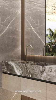 a bathroom sink sitting under a large mirror