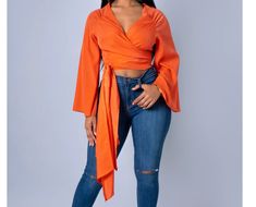 If you haven’t heard … Orange is the new black. This Orange big sleeve tie crop top blouse is super comfortable and versatile. Pair it with our “Go get ‘em wide leg jeans “ or your favorite shinny jean! Fits true to size model is wearing large Sizing Chart Go Get Em, Jean Fits, Big Sleeves, Tie Crop Top, Orange Is The New, Small Crop Tops, Orange Is The New Black, Crop Top Blouse, Wide Leg Jeans