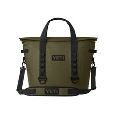 a green yeti cooler bag with black straps