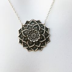 "Chunky Mandala Necklace. Lovely thick silver with a smooth back. Sterling Silver Charm 1.25\" x 1.25\" on delicate sterling silver chain. Chain is 16\" + 1.5\" extender chain to adjust to your desired length with lobster claw. Extender chain is finished with a tiny 4mm Majestic Blue Swarovski Crystal Cube. Necklace is packaged in a 3.5\"x3.5\" white jewelry box on a stiff blue jewelry card. Free polishing cloth and sticker included. Makes a perfect gift! -eva949-" Silver Sterling Silver Large Pendant Jewelry, Spiritual Sterling Silver Necklaces With Oxidized Finish, Spiritual Sterling Silver Necklace With Oxidized Finish, Sterling Silver Flower Pendant With Oxidized Finish, Antique Silver Necklace With Large Sterling Silver Pendant, Antique Silver Sterling Silver Necklace With Large Pendant, Antique Silver Flower Pendant Necklace In Sterling Silver, Sterling Silver Flower Pendant Necklace In Antique Silver, Antique Silver Sterling Silver Flower Pendant Necklace