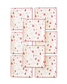 six red and white napkins with christmas trees on them