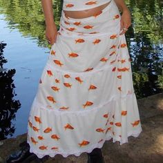 Koi Fish Maxi Skirt | BOOGZEL CLOTHING – Boogzel Clothing Fish Aesthetic Outfit, Fish Themed Outfit, Snail Clothes, Koi Fish Outfit, Fish Outfit, Orange Skirt Outfit, Fish Skirt, Y2k Prom Dress, Midi Skirt Y2k