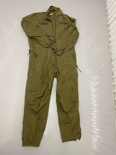 Features & Specs Made in USA ICVC Improved Combat Vehicle Crewmen's Coveralls Double front Brass Zippers  Zipper and elastic sleeves and leg openings for easy entry Heavy duty & flame resistant (92% Aramid 5% Para-Aramid 3% C-Fibers ) 11 zippered pockets 2 velcro Reinforced ankles, seat and elbows, Velcro and zipper drop seat. 1. New : Unused without tag. 2. Very good is used almost in excellent condition. 3. Used Good shows wear and has couple of repairs with patches. This Genuine Issue Crewman's Coverall is fire retardant and features lot of useful pockets. It is made in the USA from 95% fire-retardant Nomex and 5% Kevlar. These coveralls are designed to provide protection against hazards encountered by combat vehicle crewmembers. Long Sleeve Overalls With Pockets For Outdoor, Military Style Long Sleeve Khaki Jumpsuit, Khaki Military Long Sleeve Jumpsuit, Khaki Military Style Long Sleeve Jumpsuits, Military Overalls With Pockets For Outdoor, Khaki Long Sleeve Utility Overalls, Mens Overalls, Us Military, Favorite Things Gift