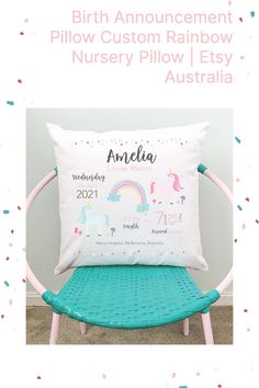 the birth pillow is sitting on a chair with pink and blue trimmings around it