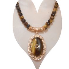 South African Yellow Tigers Eye, Brown Austrian Crystal Beaded Necklace (18.5-22.5 Inches) In Goldtone 255.00 Ctw New! Brown Gemstone Beaded Crystal Necklace, Luxury Brown Beaded Necklaces, Brown Crystal Necklace, Luxury Brown Gemstone Necklaces, Luxury Hand-strung Brown Beaded Necklaces, Yellow Tigers Eye, Crystal Beaded Necklace, Rose Choker, Brown Beaded Necklace