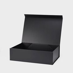 an open black box sitting on top of a table