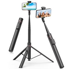 the tripod phone holder is attached to an iphone and has two cell phones on it