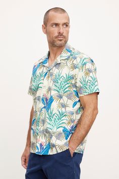 Hello vacation! A warm weather essential is the classic camp shirt and this is our take on this casual button down in a bold print that is just the right amount of eye-catching. A relaxed fit in a cotton woven. Summer Collared Camp Shirt With Palm Tree Print, Collared Camp Shirt With Palm Tree Print For Summer, Summer Camp Shirt With Palm Tree Print And Collar, Relaxed Fit Printed Hawaiian Shirt, Printed Hawaiian Shirt With Relaxed Fit, Casual Patterned Camp Shirt For Spring, Patterned Hawaiian Shirt With Relaxed Fit, Patterned Relaxed Fit Shirt With Camp Collar, Casual Unstructured Collared Camp Shirt