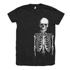 Skeleton Halloween Shirt, Womens Junior Shirt, Skeleton Tshirt, Skeleton Shirt, Spooky Skeleton Tshirt, Halloween Tshirt, Black Tshirt  Hand pressed in California by Couth. Fine Jersey Short Sleeve T Fine Jersey (100% Cotton) construction (Heather Grey contains 10% Polyester) THEY HAVE A JUNIOR FIT. A WOMEN'S XL IS ABOUT AN UNISEX SMALL How to order: Please Select your T-shirt's size and color at checkout from the drop down menu on the right and be sure to use size chart and color availability. Available sizes: S, M, L, XL New to Etsy? or still not sure how to order? https://www.etsy.com/help/article/339 We use water base ink and discharge base ink that gives the shirt a very soft feel. We hand screen print each shirt to ensure quality Please let us know if you have a preferred color. We c Edgy Halloween T-shirt With Screen Print, Spooky Skull Print T-shirt For Streetwear, Gothic Short Sleeve T-shirt With Skull Print, Spooky Black T-shirt With Skull Print, Fitted T-shirt With Skull Graphic Print, Fitted Grunge Skull Print T-shirt, Fitted Grunge T-shirt With Skull Print, Graphic Tee Shirt With Skull Print And Crew Neck, Halloween Crew Neck Top For Alternative Fashion