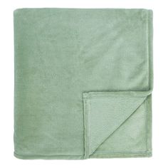 a light green blanket folded on top of a white background with a pocket in the middle