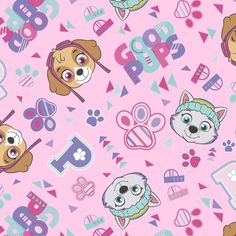 a pink background with small dogs on it and some other things in the background, including a ruler