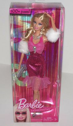 the barbie doll is wearing a pink dress