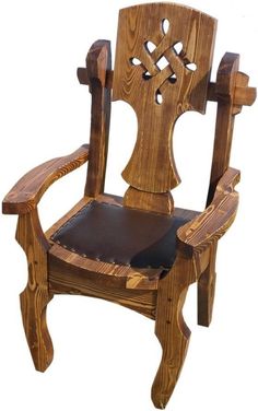 a wooden chair with black leather seat and armrests, on a white background