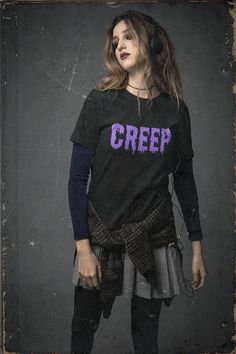 CREEP! ►Please check Size Charts in Photos! *Unisex Sizing for Adults - Bella Canvas 3001 ►Fabrication: The Premium Bella Canvas Shirt fits like a well-loved favorite, featuring a crew neck, short sleeves and designed with superior combed and ring-spun cotton. Features: Side seamed. Retail fit. Unisex sizing. Shoulder taping. Tear Away Label. Light Fabric. ►Please contact me direct with any order problems and I will be happy to find a resolution with you! Exchanges will be issued promptly in the event of defect or misprint. ►We love hearing about your shopping experience and we encourage provide your feedback. If you are satisfied with our service, your review is greatly appreciated. Trendy Halloween T-shirt For Alternative Fashion, Purple Grunge Crew Neck Top, Purple Crew Neck Grunge Top, Grunge Halloween Streetwear Shirt, 90s Style Halloween Streetwear Top, 90s Crew Neck Halloween Tops, Edgy Halloween Tops, Grunge Purple Top With Screen Print, Purple Grunge Top With Screen Print