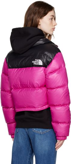 Down-filled quilted nylon ripstop jacket. · Stand collar · Zip closure · Logo patch at front and back · Zip pockets · Bungee-style drawstring at hem · Adjustable velcro straps at cuffs · Full taffeta lining Supplier color: Fuchsia pink Fill: 85% waterfowl down, 15% waterfowl feathers. Nuptse Short Jacket, The North Face Jacke, Pink North Face Jacket, North Face Outfits, Retro Nuptse Jacket, Down Winter Coats, North Face Nuptse, North Face Shorts, Fuschia Pink