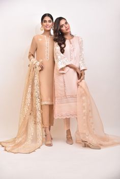 A rich tone of deep beige cotton net with hand sheesha work, paired with a delicate embroidered dupatta and matching raw silk trousers, revamp your wardrobe with this gorgeous three piece. Delivery Time: 6-8 weeks Cream Anarkali Sharara With Dabka Detailing, Cream Anarkali Sharara With Dabka Embroidery, Designer Semi-stitched Beige Churidar, Cream Cotton Silk Churidar With Resham Embroidery, Designer Beige Anarkali Set With Dupatta, Beige Anarkali Set With Dupatta For Designer Wear, Beige Chanderi Kurta With Dabka Detailing, Elegant Beige Raw Silk Churidar, Sheer Raw Silk Dupatta